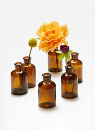 dark amber glass bottle bud vase 