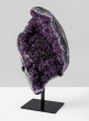 amethyst geode on metal stand